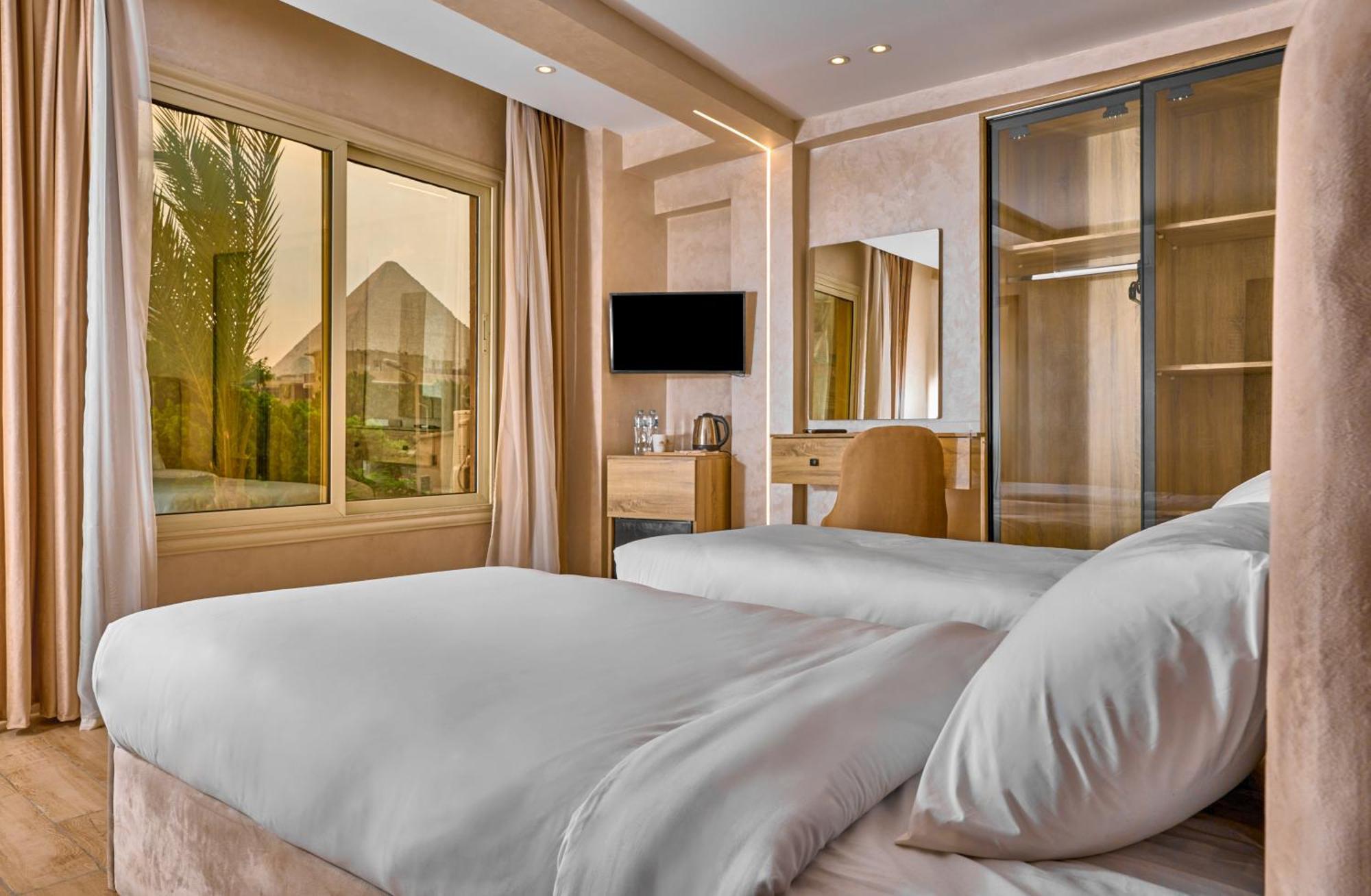 Hotel Cleopatra Tower Pyramid View Kafret el-Gabal Exterior foto